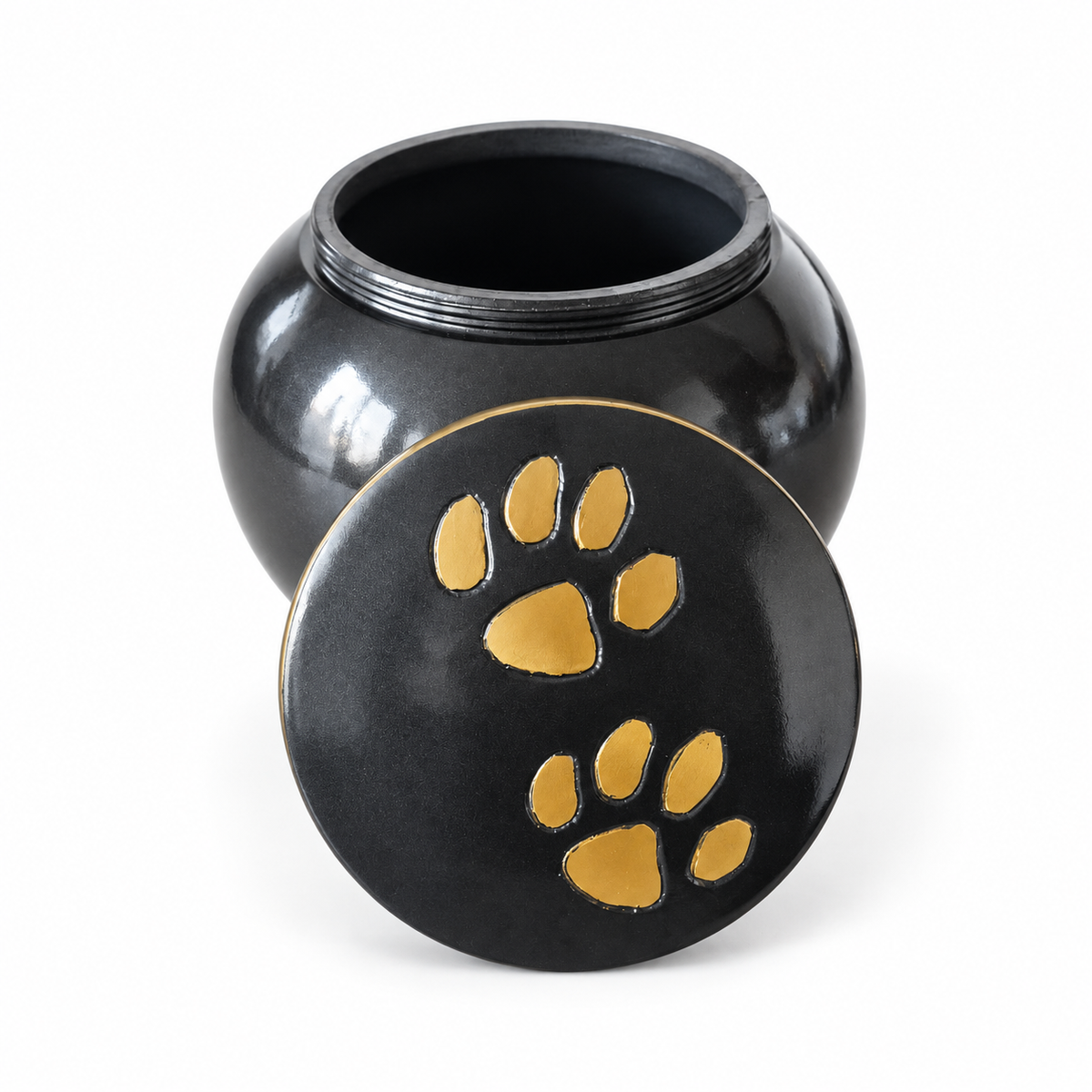 De laatste aai antracietgrijze aluminium urn met gouden pootafdrukken op het deksel voor huisdieren tot 15 kg.