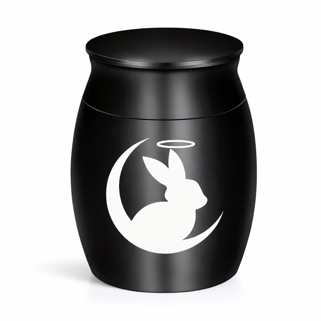 De laatste aai matzwarte RVS mini urn voor konijn met wit silhouet van een konijntje in de maan en een engelenhalo