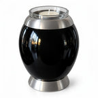 De laatste aai zwarte aluminium mini urn met glazen waxinelichthouder en zilverkleurige details voor huisdieras.
