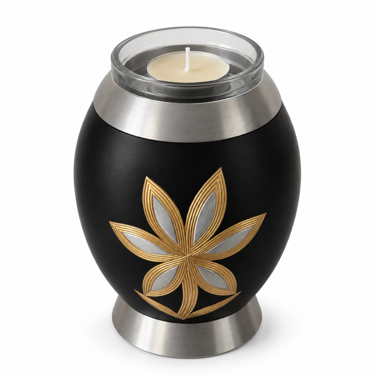 De laatste aai zwarte aluminium mini urn met goud-zilveren lelie motief en glazen waxinelichthouder voor as.