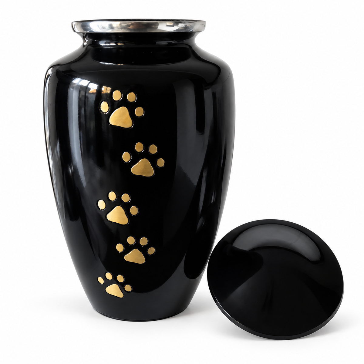 De laatste aai zwarte aluminium urn voor huisdieren met handgelegde gouden pootafdrukken en zilverkleurige rand.
